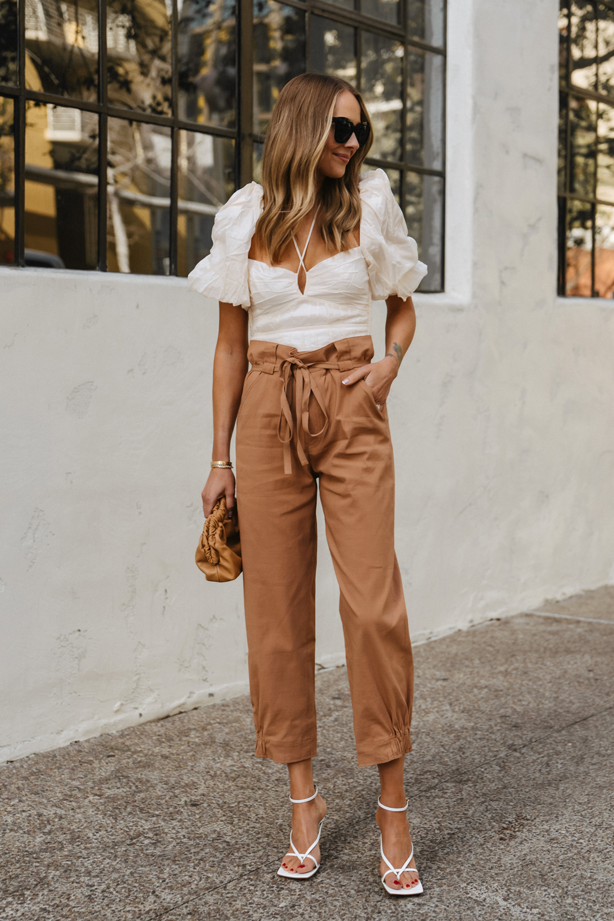 Fashion Jackson Wearing puff sleeve crop top outfit brown pants womens outfit bottega veneta stretch sandals white chic spring outfit 2022 street style 1