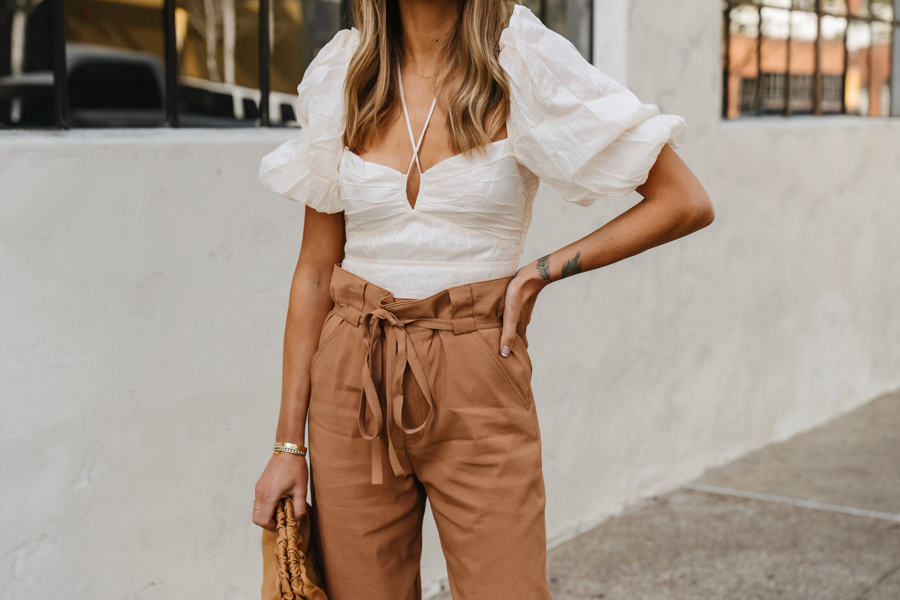 Fashion Jackson Wearing puff sleeve crop top outfit brown pants womens outfit chic spring outfit 2022