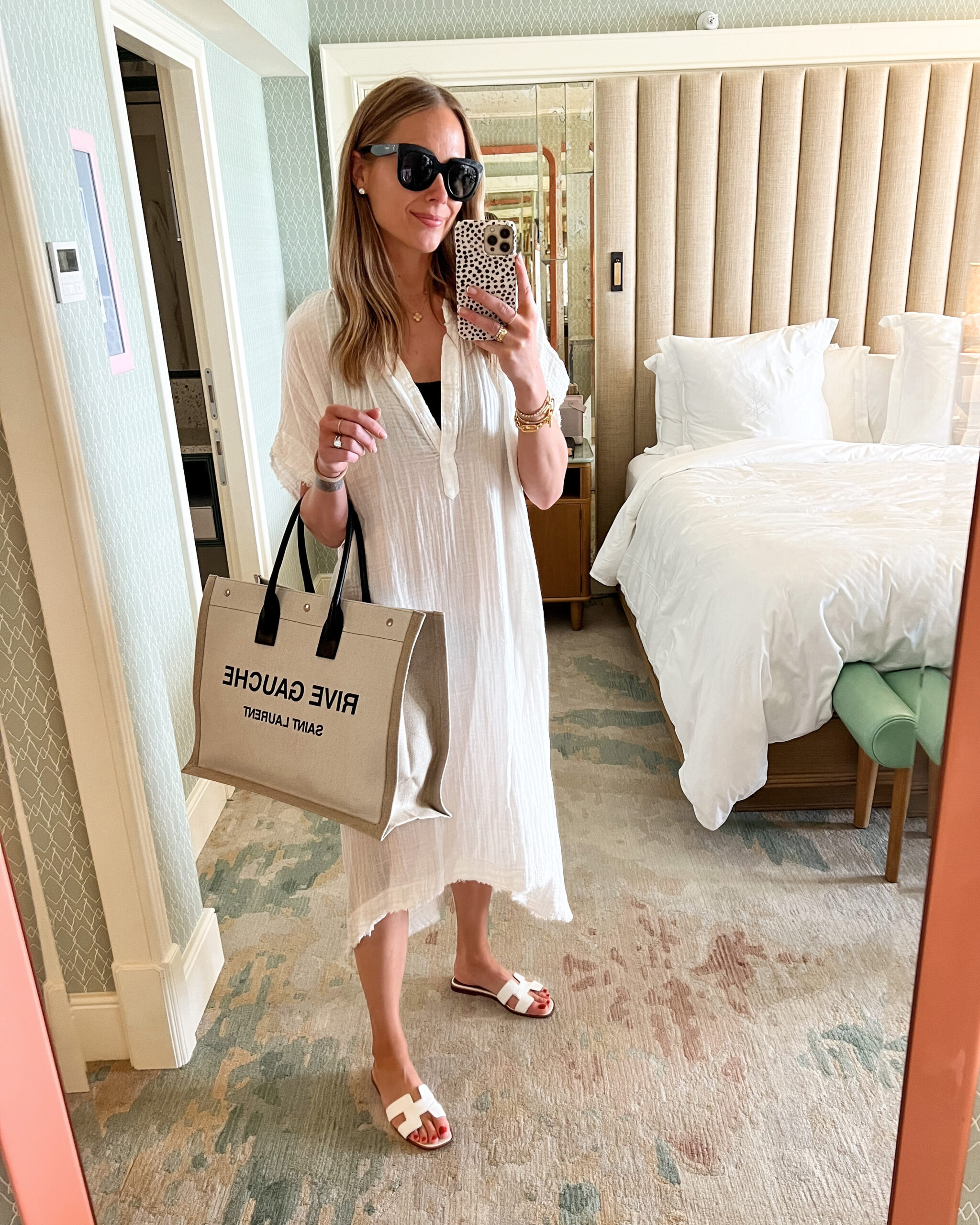 Fashion Jackson wearing white tunic coverup, Hunza g swimsuit, white Hermes sandals, Saint Laurent tote, pool outfit, beach outfit, palm beach, vacation