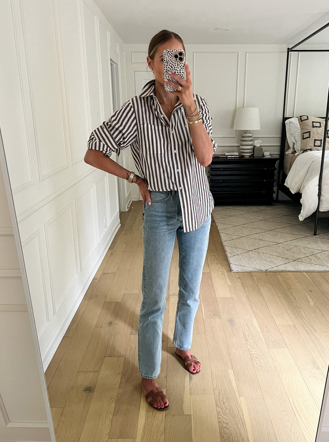 Fashion Jackson Wearing Amazon Drop Striped Button Up Shirt AGOLDE Lana Jeans Hermes Oran Gold Sandals