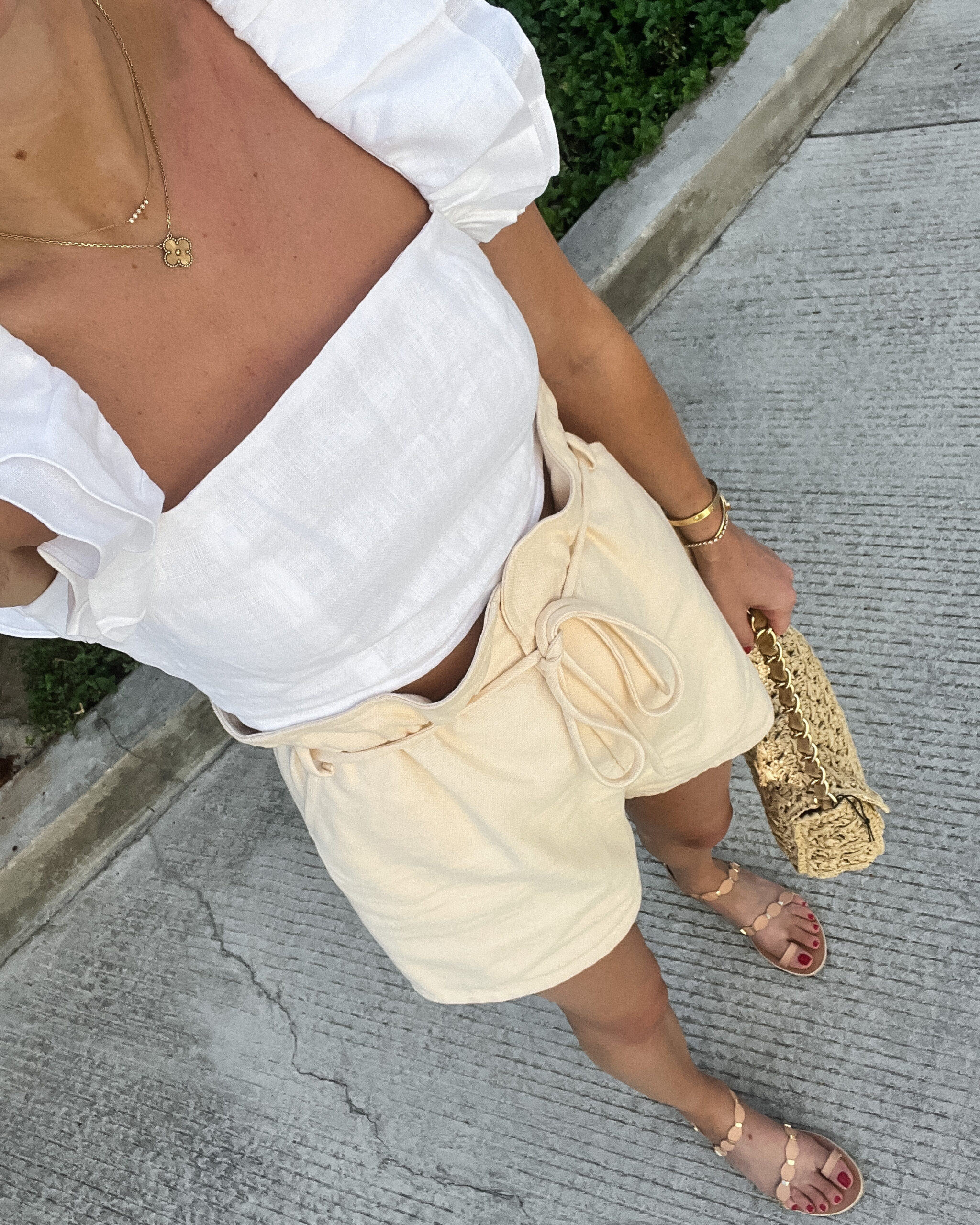 Fashion Jackson Wearing White Ruffle Sleeve Top Paperbag Waist Shorts Ancient Greek Sandals