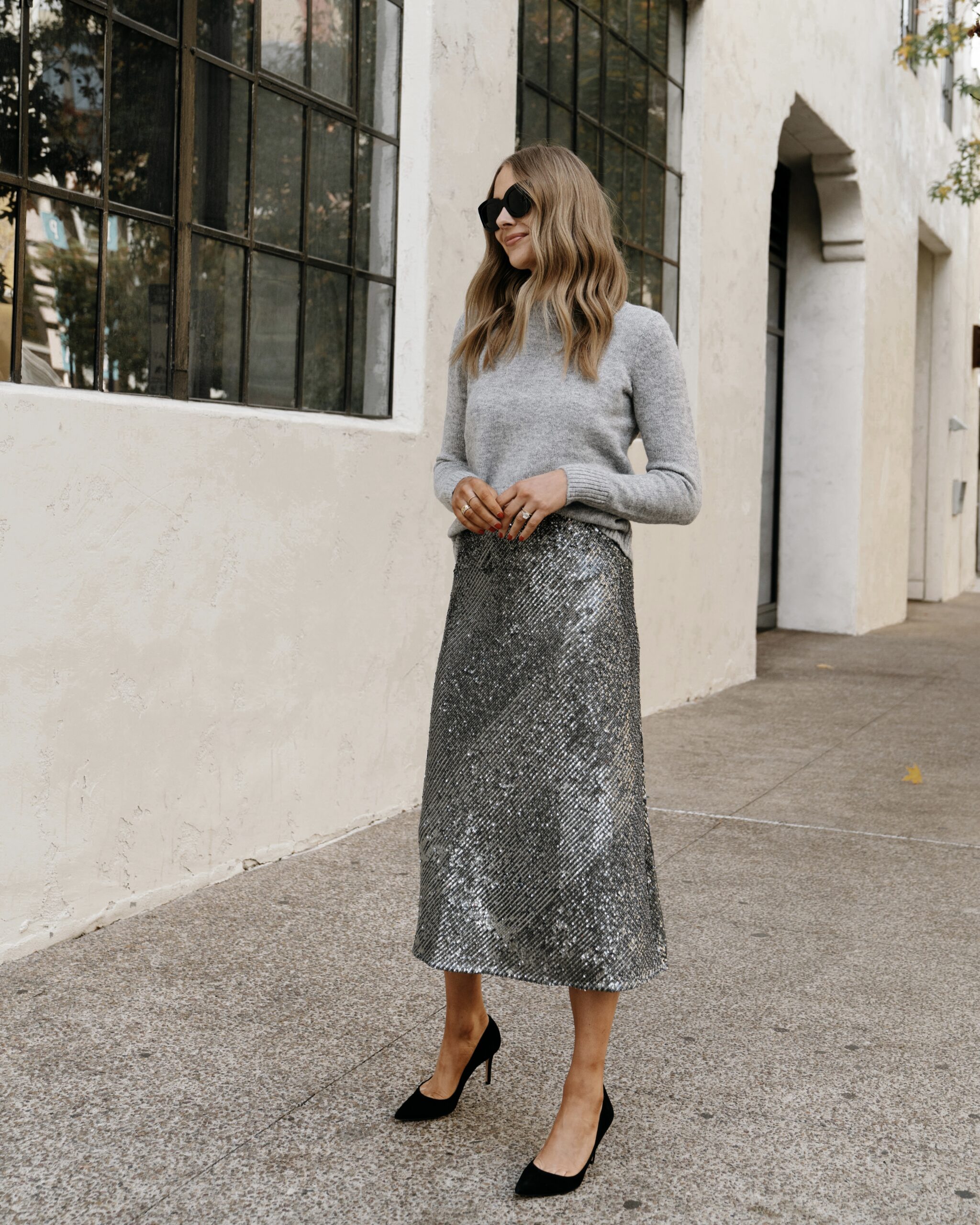 Fashion Jackson Wearing Grey Sweater Silver Sequin Skirt Black Pumps Holiday Outfit
