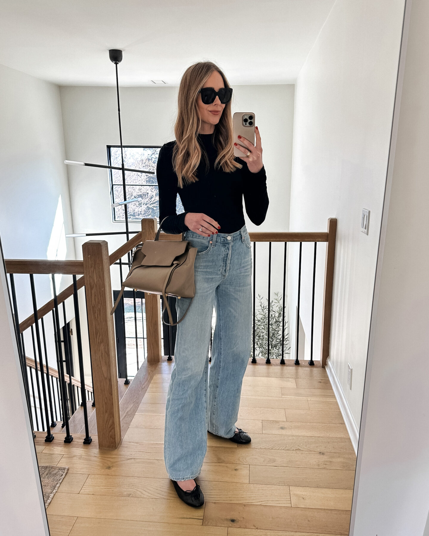 Fashion Jackson Wearing Amazon Fashion Black Mock Neck Top Citizens of Humanity Annina Trouser Jeans Chanel Black Ballet Flats Celine Mini Belt Bag Fall Outfit Daily Look