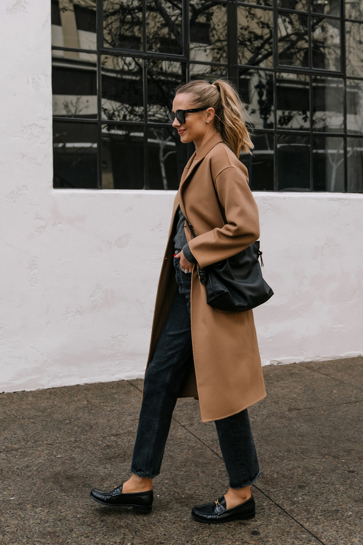 Fashion Jackson Wearing Anine Bing Dylan Coat Charcoal Sweater AGOLDE Black Jeans Celine Luco Triomphe Loafers Black Loewe Flamenco Handbag Camel Coat Outfit For Women Loafer Outfit Street Style