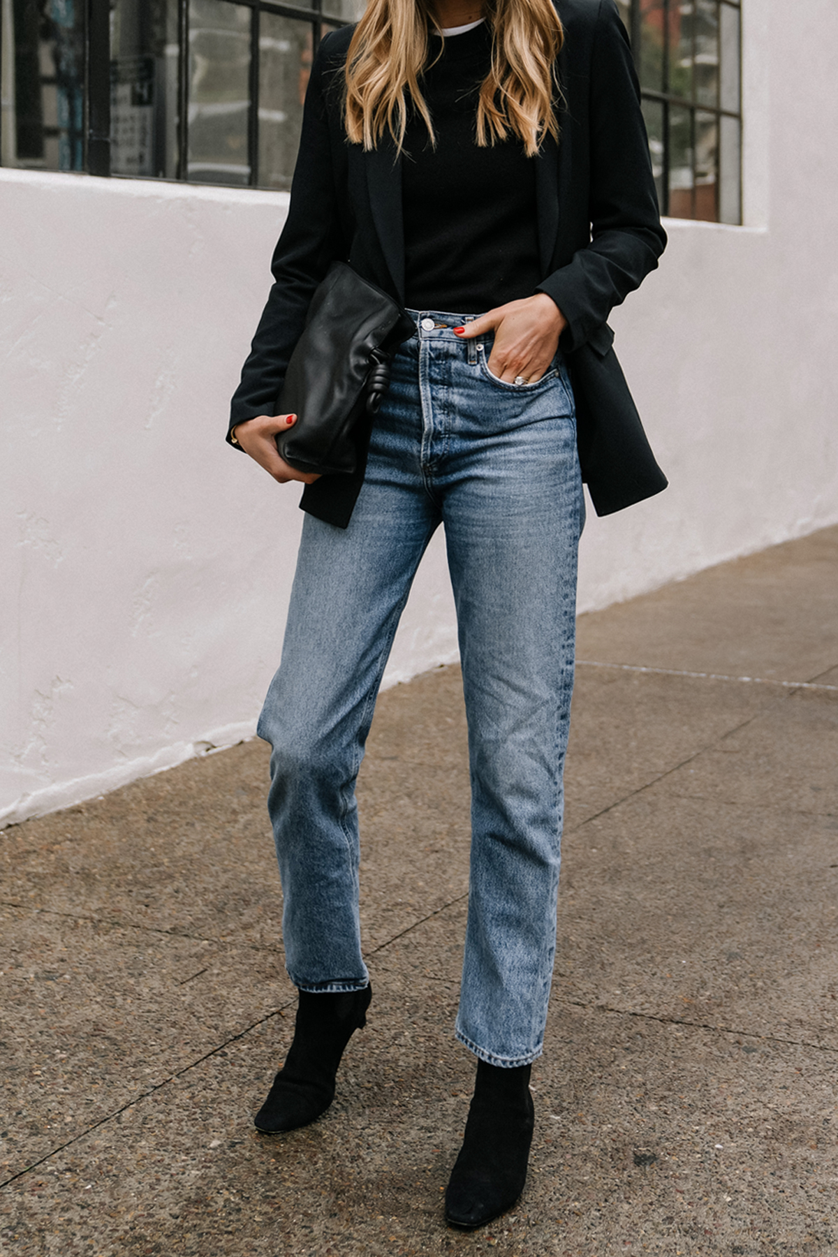 Fashion Jackson Wearing Black Blazer White Tshirt Black Sweater AGOLDE 90s Jeans Toteme Black Booties Loewe Black Handbag business casual outfit with jeans and boots