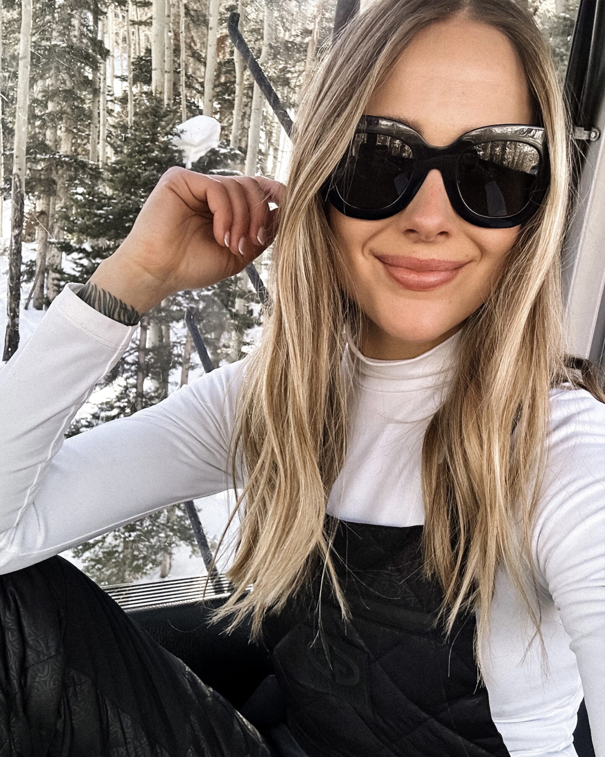 Fashion Jackson Wearing Winter Ski Outfit White Turtleneck Black Ski Bibs