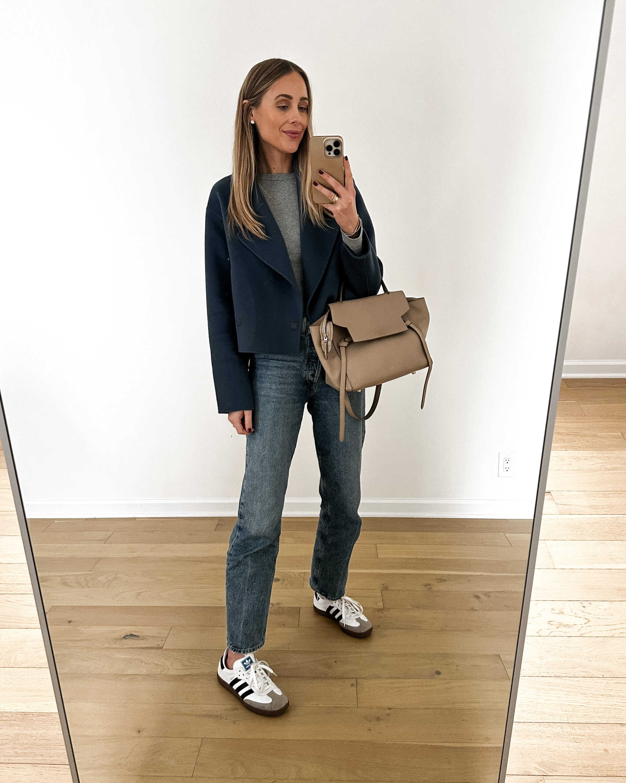 Fashion Jackson Wearing MAYSON the label blue cashmere cropped jacket, grey long sleeve tee, AGODLE jeans, adidas samba sneakers, celine mini belt bag, casual fall weekend outfit