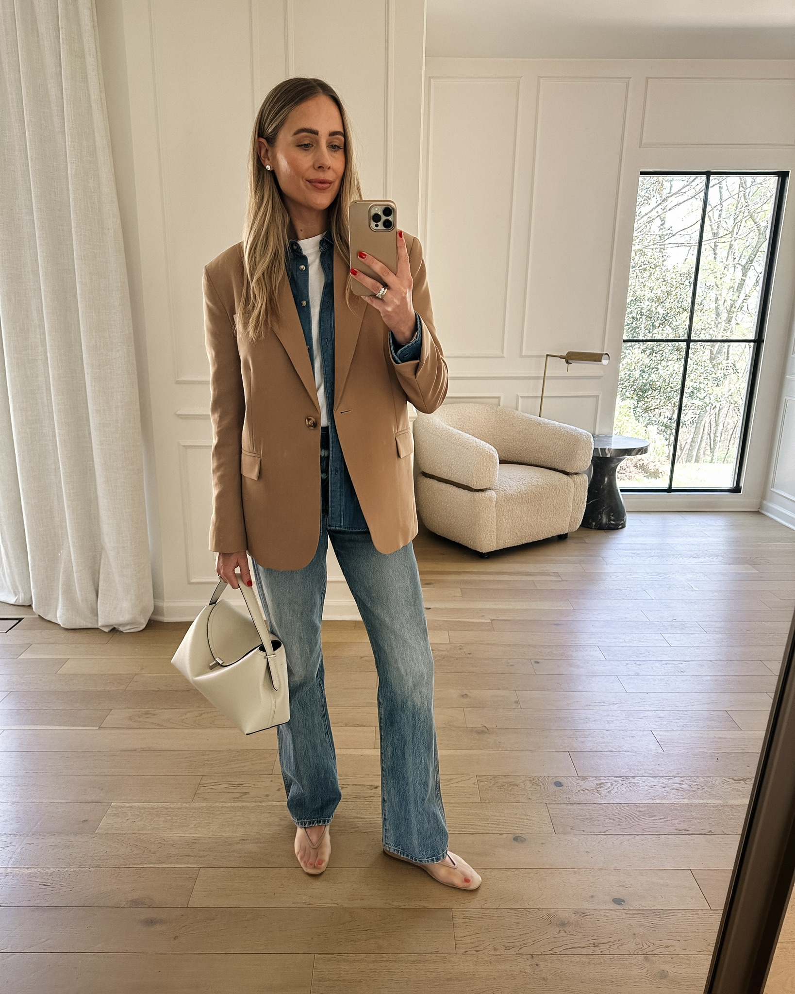 Fashion Jackson wearing MAYSON the label camel blazer, denim button up shirt, jeans, sheer ballerina flats, spring look, chic office look