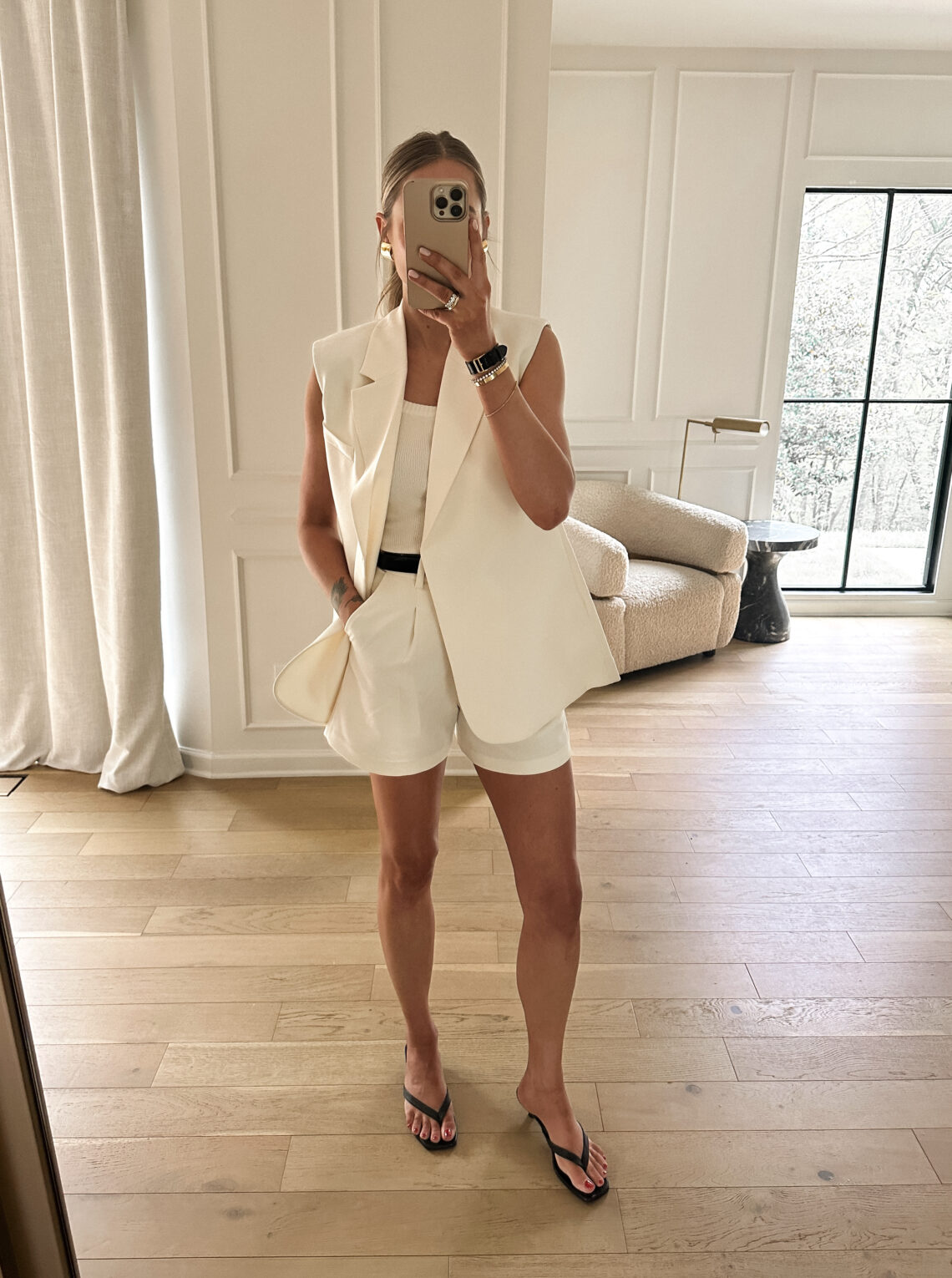 Fashion Jackson Wearing MAYSON the label Ivory Vest Ivory Tank Ivory Shorts Black Sandals Spring Outfit