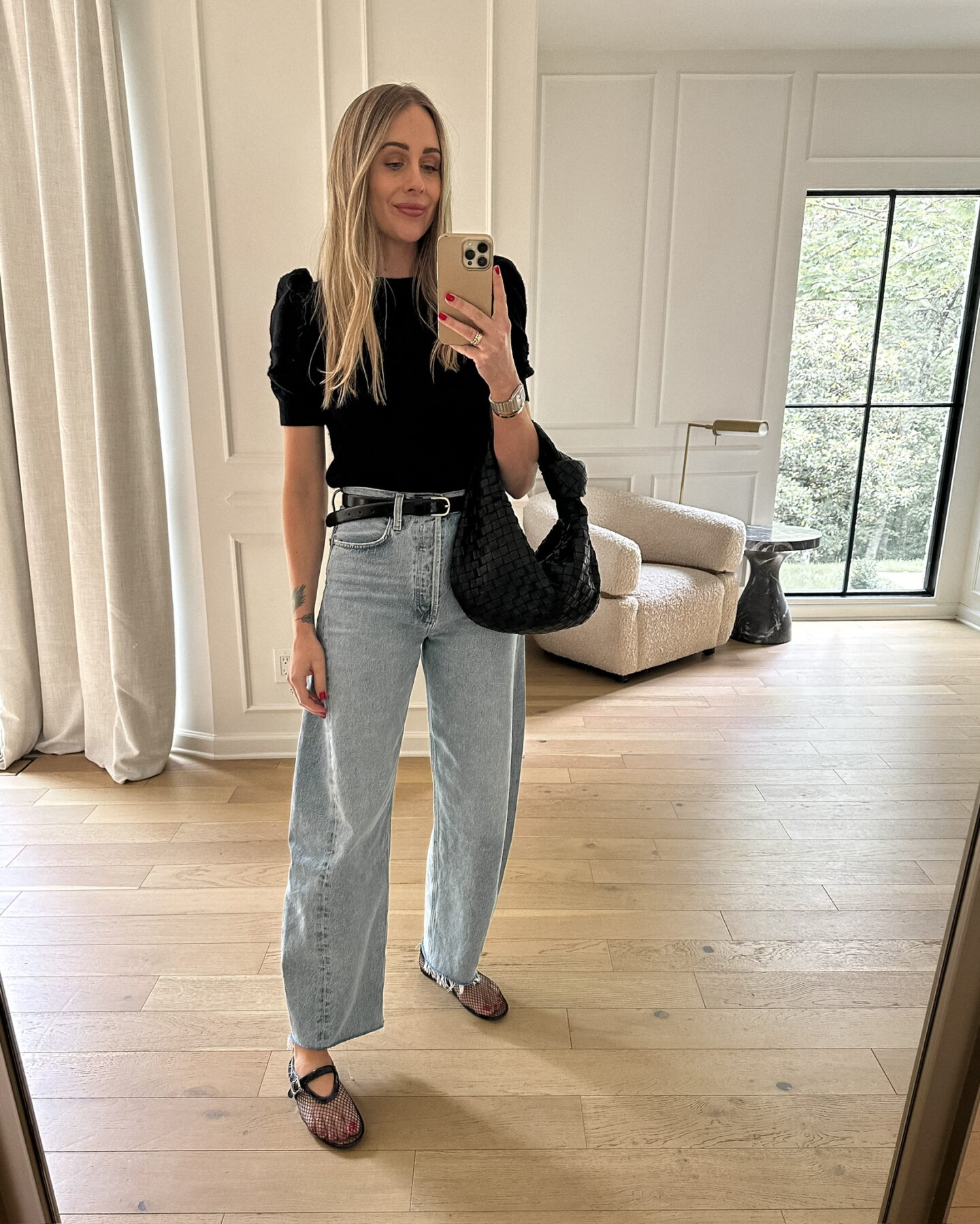 Fashion Jackson wearing Frame sweater, AGOLDE jeans, Amazon mesh flats, summer outfit